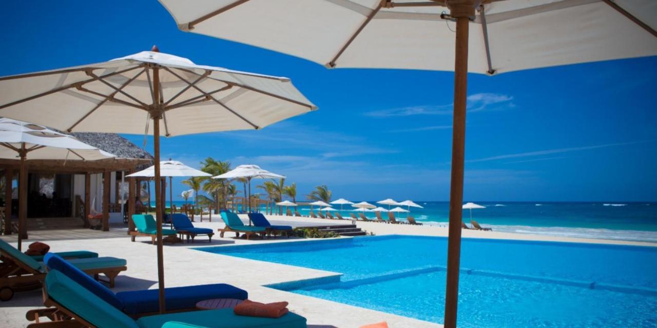 Cana Rock Condos Infinity Pool & Beach Suites ปุนตากานา ภายนอก รูปภาพ